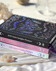 2025 Annual Moon Planner in multiple colors stacked by Goddess Provisions