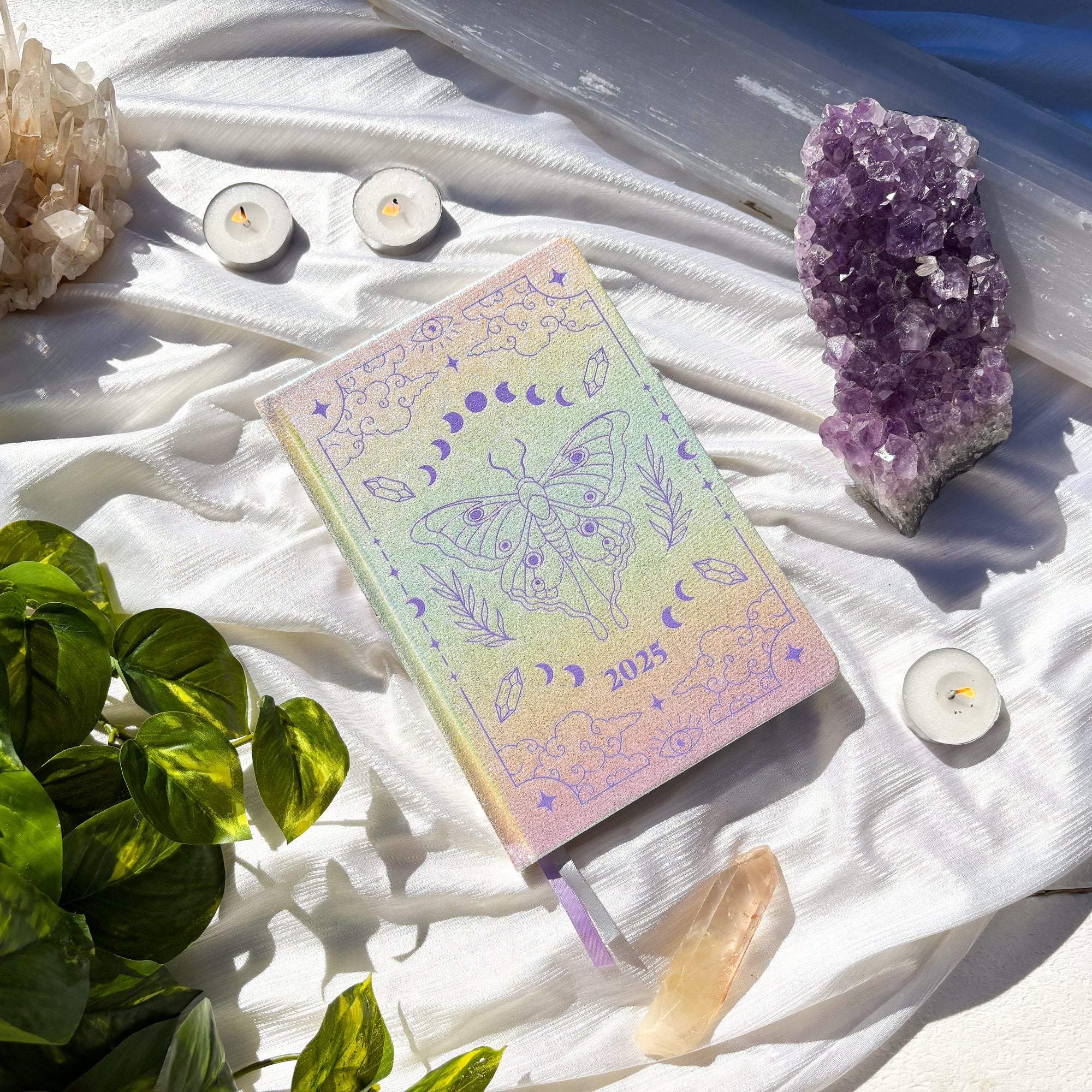 2025 Annual Planner in purple and pink with hologram cover