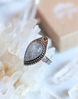 Adjustable antique silver-plated brass Clear Quartz Moonlight Ring featuring a crescent moon and crystal design. Available at Goddess Provisions