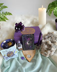 Intuitive Alchemy subscription box featuring spiritual tools designed to strengthen intuition, support transformation, and guide inner alchemy through ritual and self-reflection.