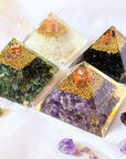 Four Orgone pyramids with Gold purple and green colors Healing Crystals