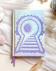 2026 planner in silver rainbow holographic vegan leather with lavender design.