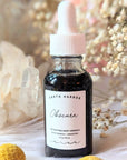 Detoxify and rejuvenate your skin with Obscura Ampoule Serum. Infused with Black Seaweed and Bamboo Charcoal, this vegan elixir refreshes all skin types. Available at Goddess Provisions.