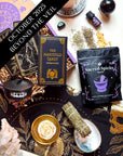 Veil Between Worlds subscription box displayed with spiritual items for ancestral rituals and remembrance.