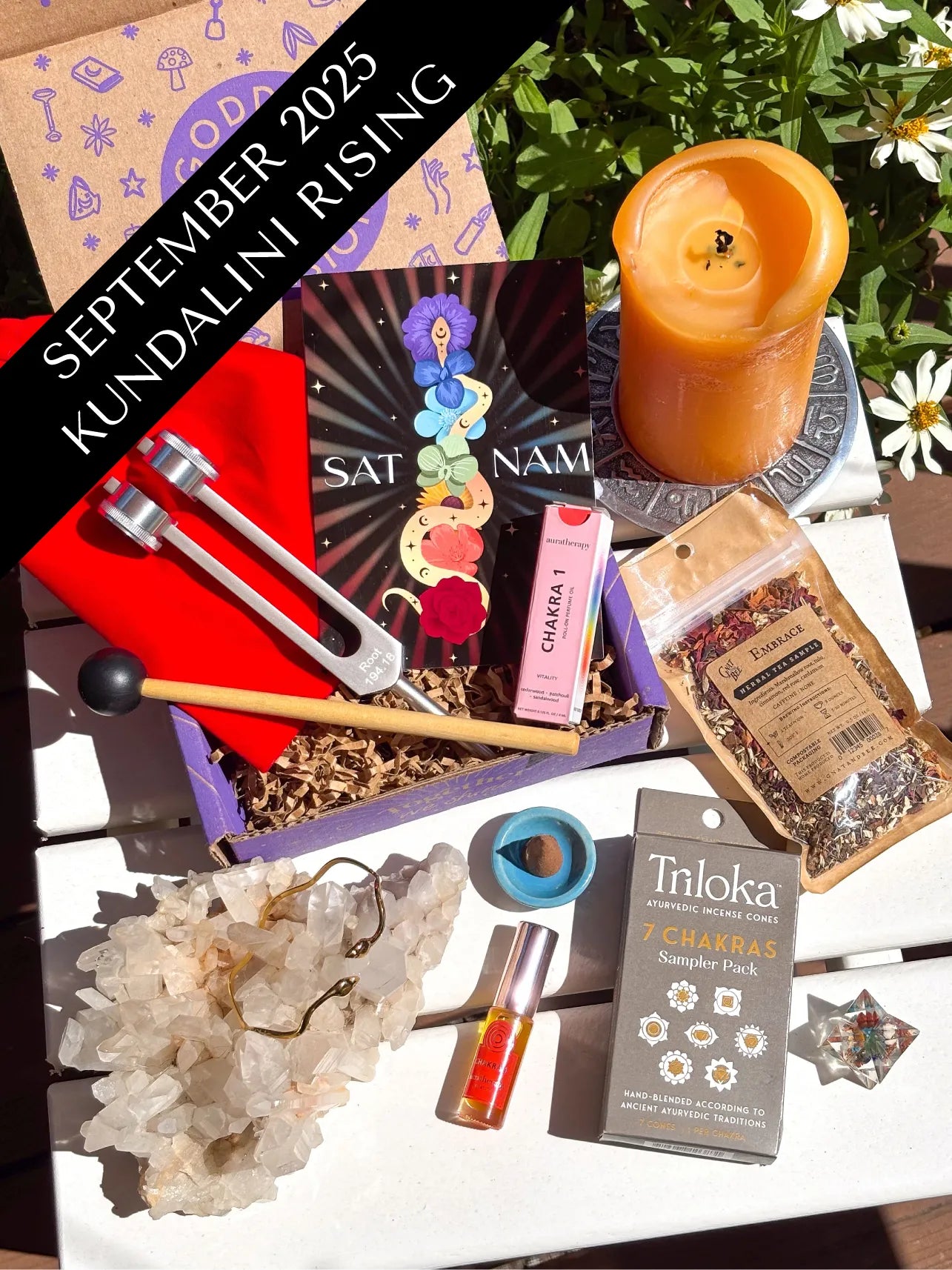 Kundalini Rising subscription box featuring spiritual tools inspired by the divine feminine and Kundalini energy, designed to awaken intuition, balance chakras, and deepen grounding practices.