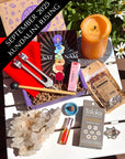 Kundalini Rising subscription box featuring spiritual tools inspired by the divine feminine and Kundalini energy, designed to awaken intuition, balance chakras, and deepen grounding practices.