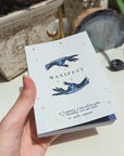 Dreamy moons manifest workbook featuring journal prompts and vision boards. Available at Goddess Provisions