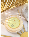 Sun Shower Steamer - Orange - Lemon - Ylang Ylang and Rosemary essential oil at Goddess Provisoins with leave background by Atma Botânica