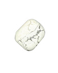 Experience tranquility with the tumbled White Howlite. This soothing crystal supports emotional balance, patience, and spiritual growth, perfect for meditation and healing rituals. Available at Goddess Provisions.