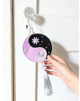 The Yin Yang Decorative Hanger is perfect for bedroom doors, drawer handles, or as wall decor. Available at Goddess Provisions