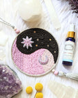 The Yin Yang Decorative Hanger is perfect for bedroom doors, drawer handles, or as wall decor. Available at Goddess Provisions