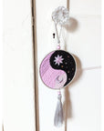The Yin Yang Decorative Hanger is perfect for bedroom doors, drawer handles, or as wall decor. Available at Goddess Provisions