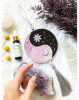 The Yin Yang Decorative Hanger is perfect for bedroom doors, drawer handles, or as wall decor. Available at Goddess Provisions