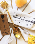 Celestial Tea Set including mug, tea towel, and golden spoon. Available at Goddess Provisions.