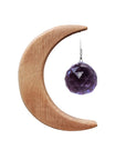 Crescent Moon Rainbow Maker. Made of wood and crystal. Available at Goddess Provisions