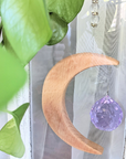 Crescent Moon Rainbow Maker. Made of wood and crystal. Available at Goddess Provisions
