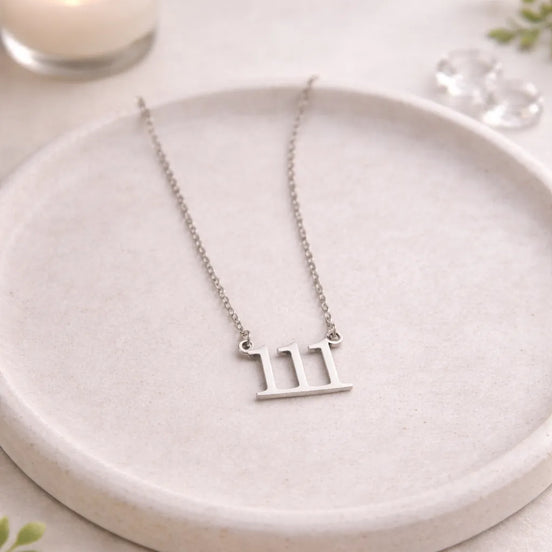 Silver 111 angel number necklace symbolizing intuition, manifestation, and spiritual alignment