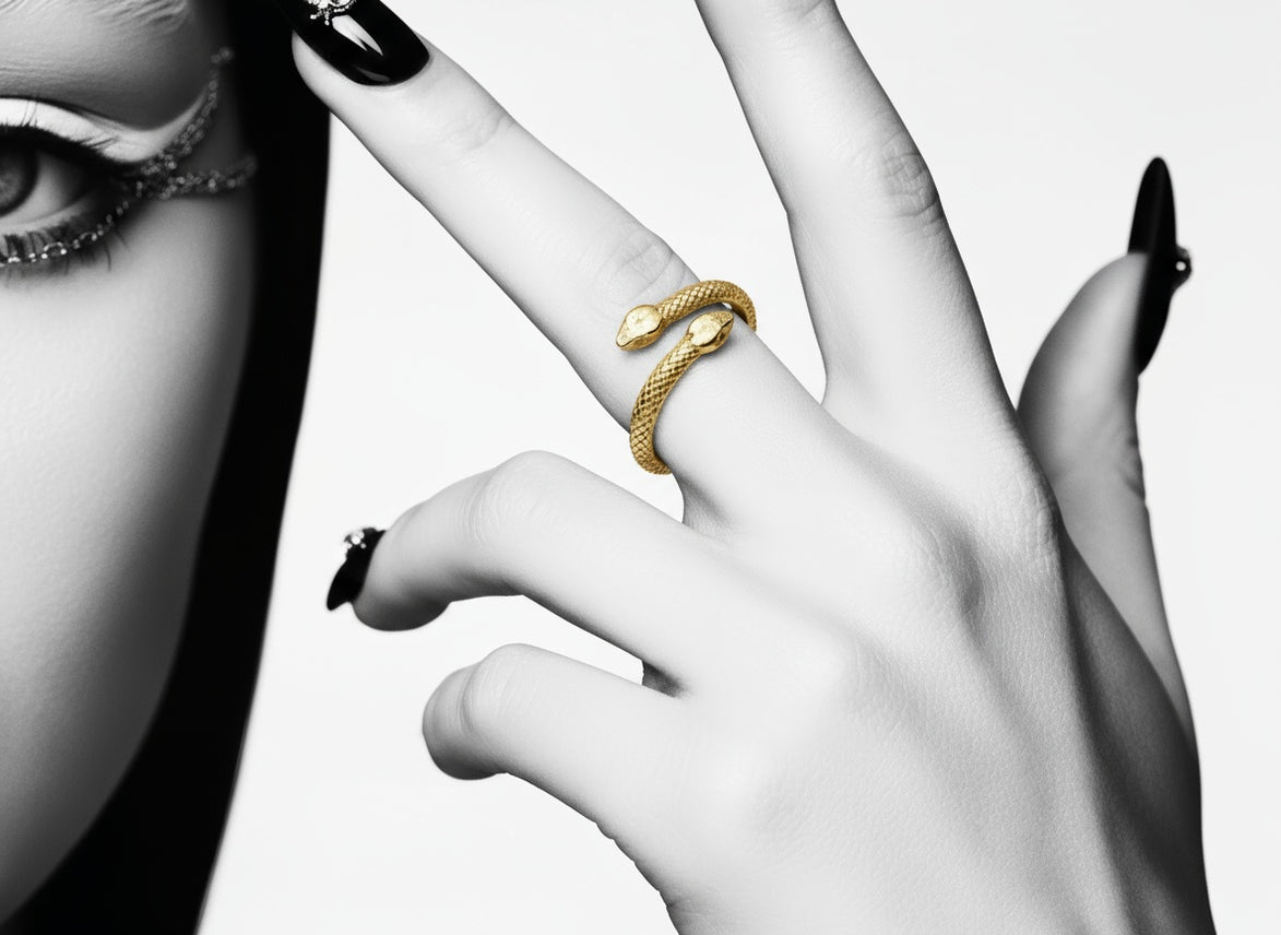 Close-up detail of the solid 18k gold snake ring showing the serpent head and scales