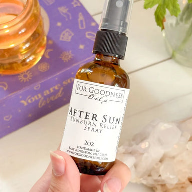 After sun spray bottle with aloe and essential oils for cooling post-sun care.