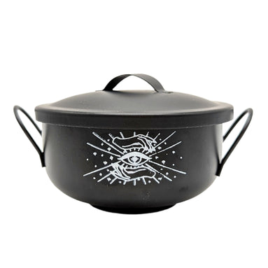 Black Mystical Cauldron with white background and white logo of an eye and two hands on the front. Available at Goddess Provisions