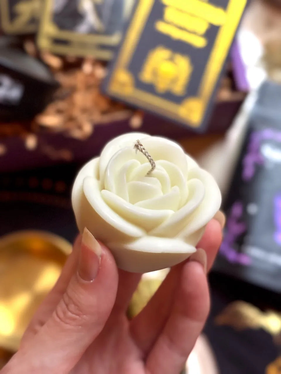 White rose candle used for ritual, meditation, and spiritual remembrance.