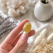 citrine tumbled stone for abundance, manifestation, and positive energy rituals