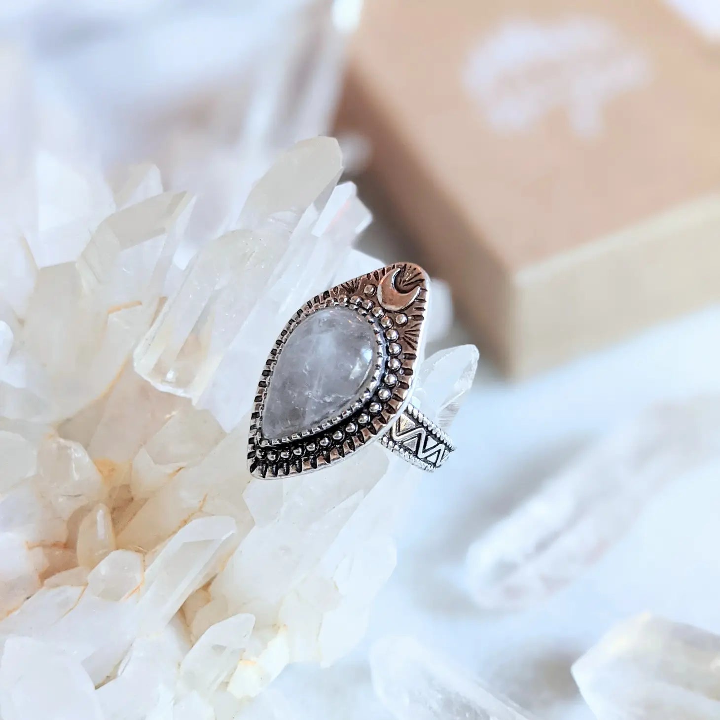 Adjustable antique silver-plated brass Clear Quartz Moonlight Ring featuring a crescent moon and crystal design. Available at Goddess Provisions