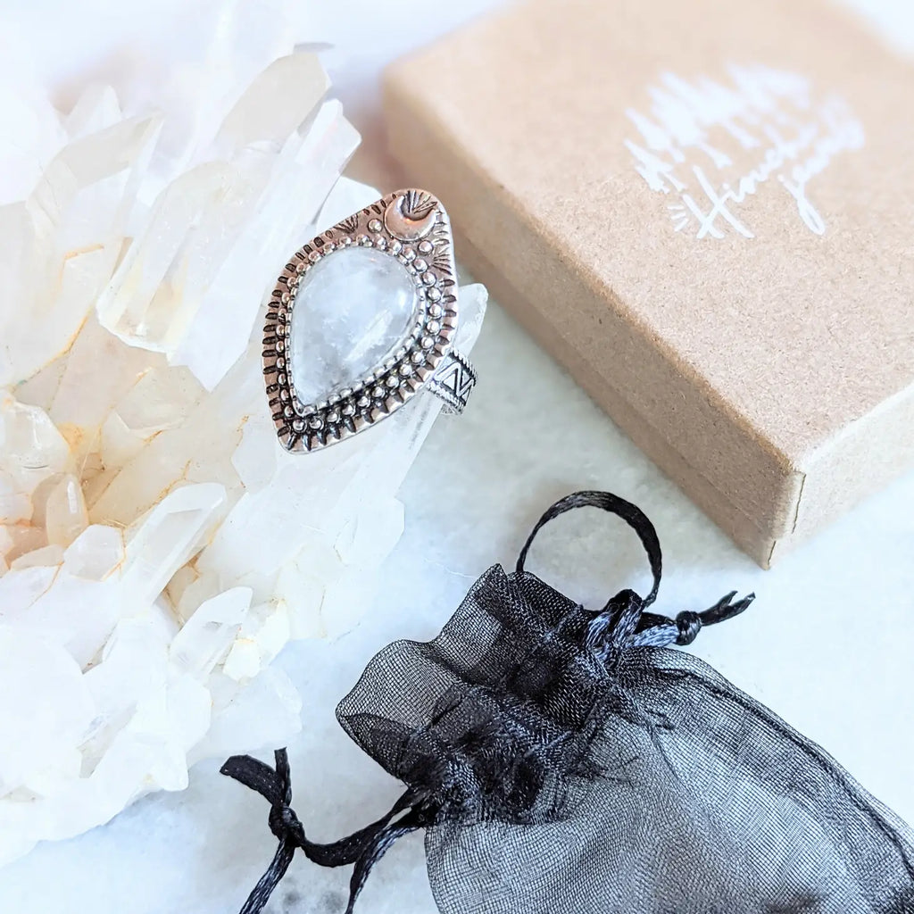 Adjustable antique silver-plated brass Clear Quartz Moonlight Ring featuring a crescent moon and crystal design. Available at Goddess Provisions