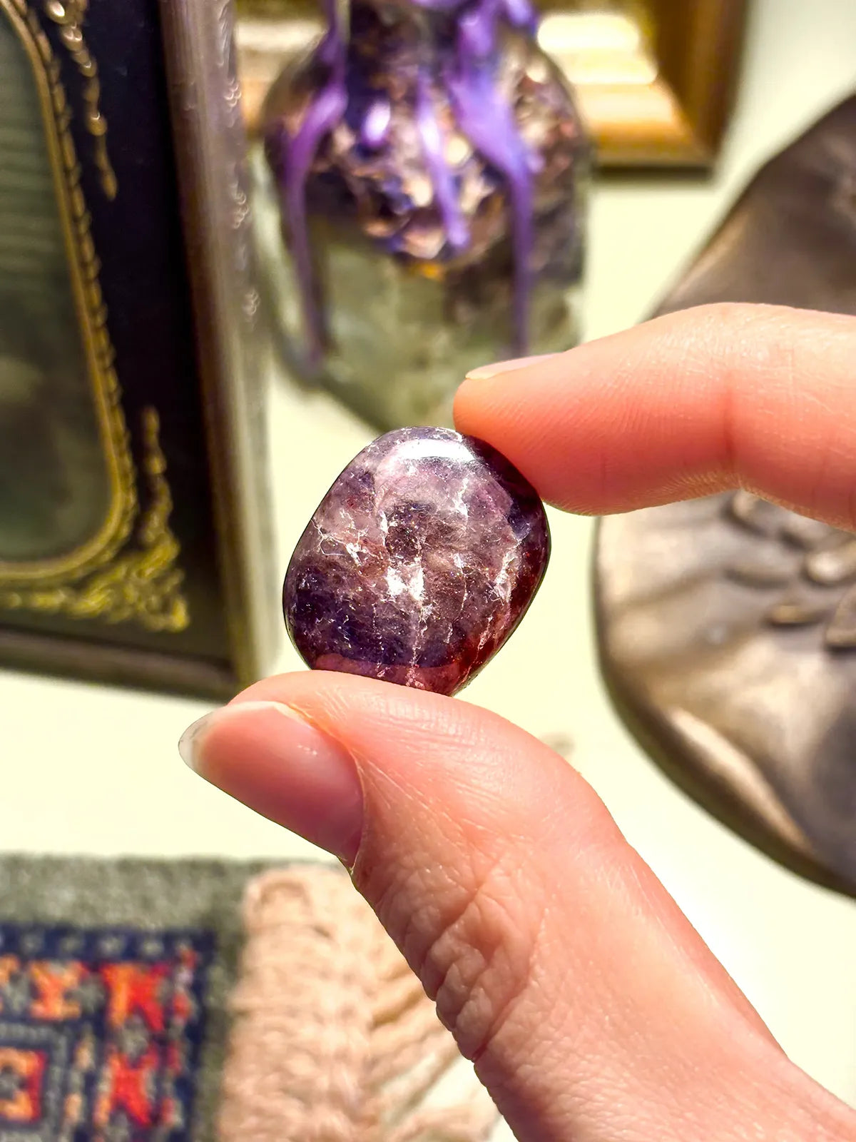 Raw Iolite gemstone showing natural indigo tones and smooth texture