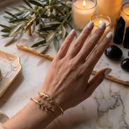 olive leaf cuff bracelet in gold and silver inspired by ancient symbols of protection