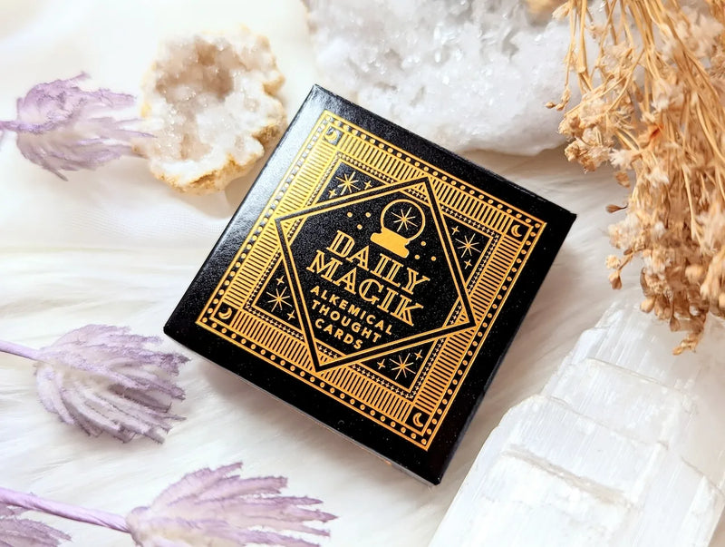 Daily Magik Card Set with illustrated mini guidance cards displayed beside crystals and candles.