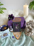 Intuitive Alchemy subscription box featuring spiritual tools designed to strengthen intuition, support transformation, and guide inner alchemy through ritual and self-reflection.