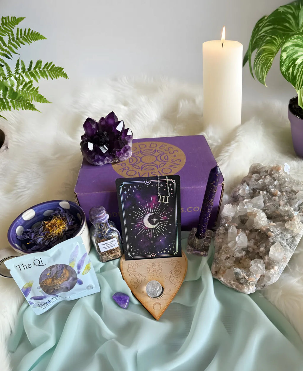 Intuitive Alchemy subscription box featuring spiritual tools designed to strengthen intuition, support transformation, and guide inner alchemy through ritual and self-reflection.