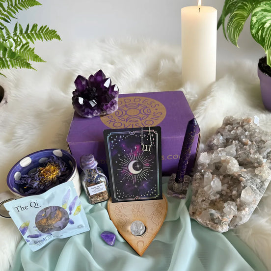 Intuitive Alchemy subscription box featuring spiritual tools designed to strengthen intuition, support transformation, and guide inner alchemy through ritual and self-reflection.