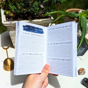 Dreamy moons manifest workbook featuring journal prompts and vision boards. Available at Goddess Provisions