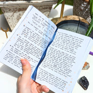 Dreamy moons manifest workbook featuring journal prompts and vision boards. Available at Goddess Provisions