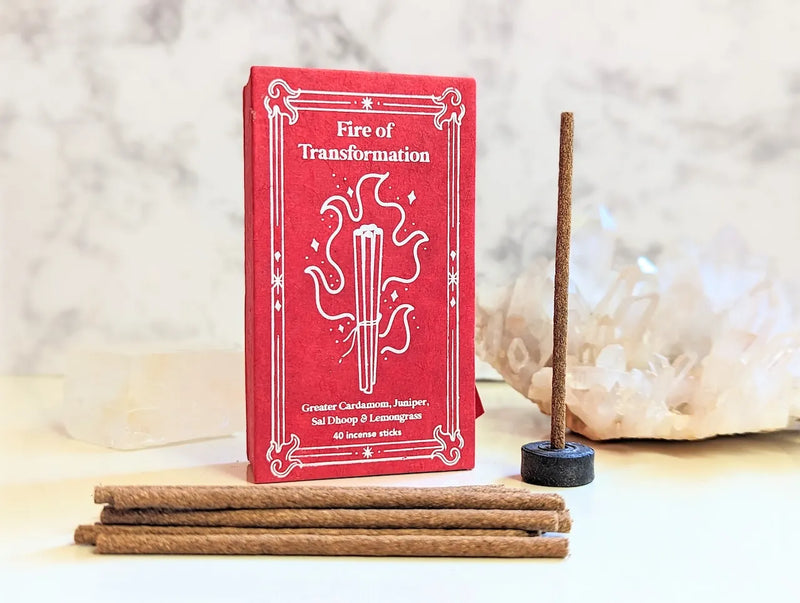 Handcrafted Himalayan incense sticks with natural botanicals styled in a calming spiritual space.