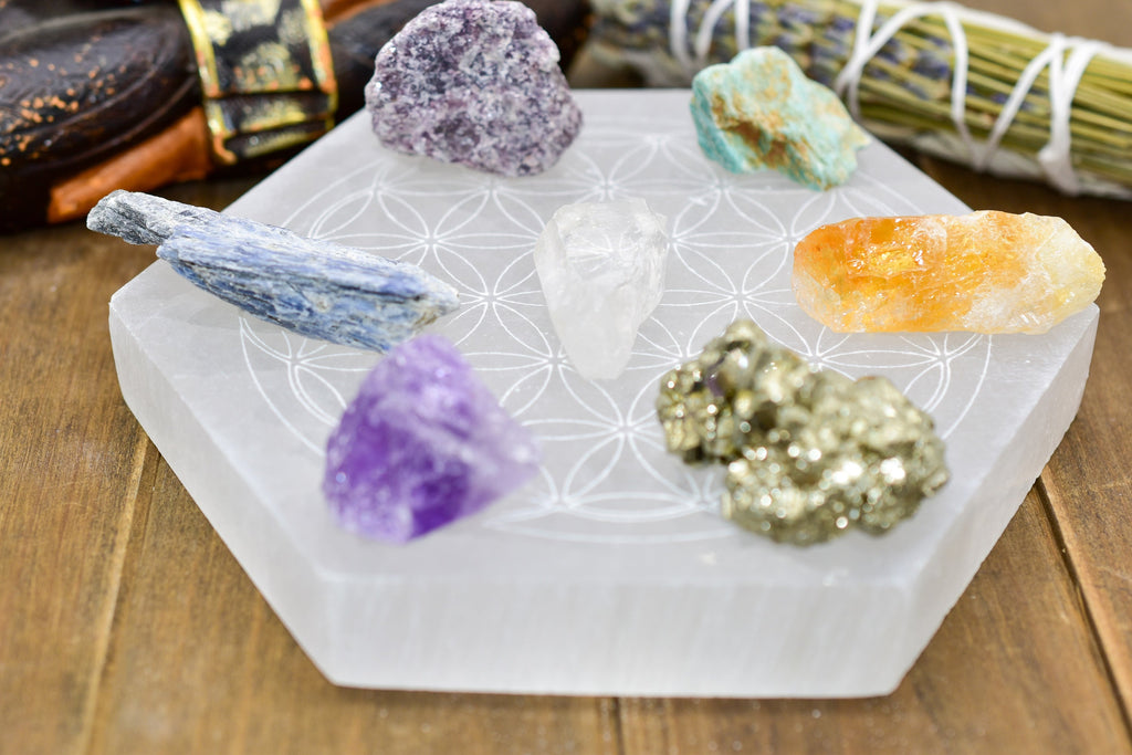 Flower of Life Engraved Selenite Plate on wood background | Goddess Provisions