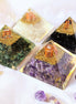 Four Orgone pyramids with Gold purple and green colors Healing Crystals