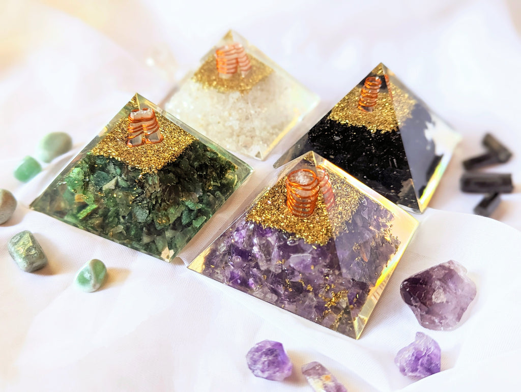 Four Orgone pyramids with Gold purple and green colors Healing Crystals