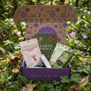 spiritual self care subscription box featuring herbal wellness tools, crystal, smudge bundle, and mushroom gummies