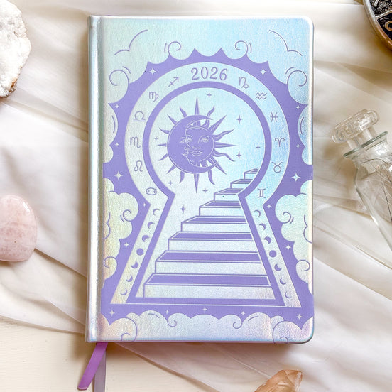 2026 planner in silver rainbow holographic vegan leather with lavender design.