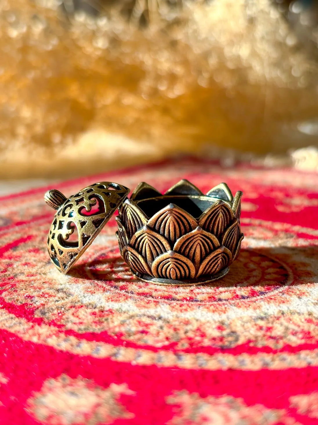 Lotus-shaped ceramic incense holder used for burning incense in yoga, meditation, or home altar spaces.