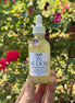 In Bloom shimmer body oil with Magnolia and Peony fragrance for radiant, hydrated skin