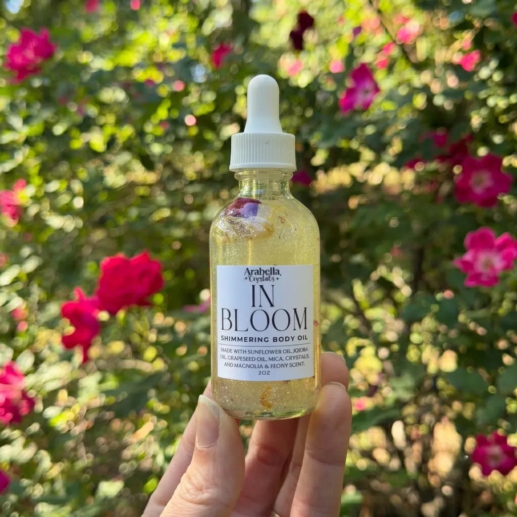 In Bloom shimmer body oil with Magnolia and Peony fragrance for radiant, hydrated skin