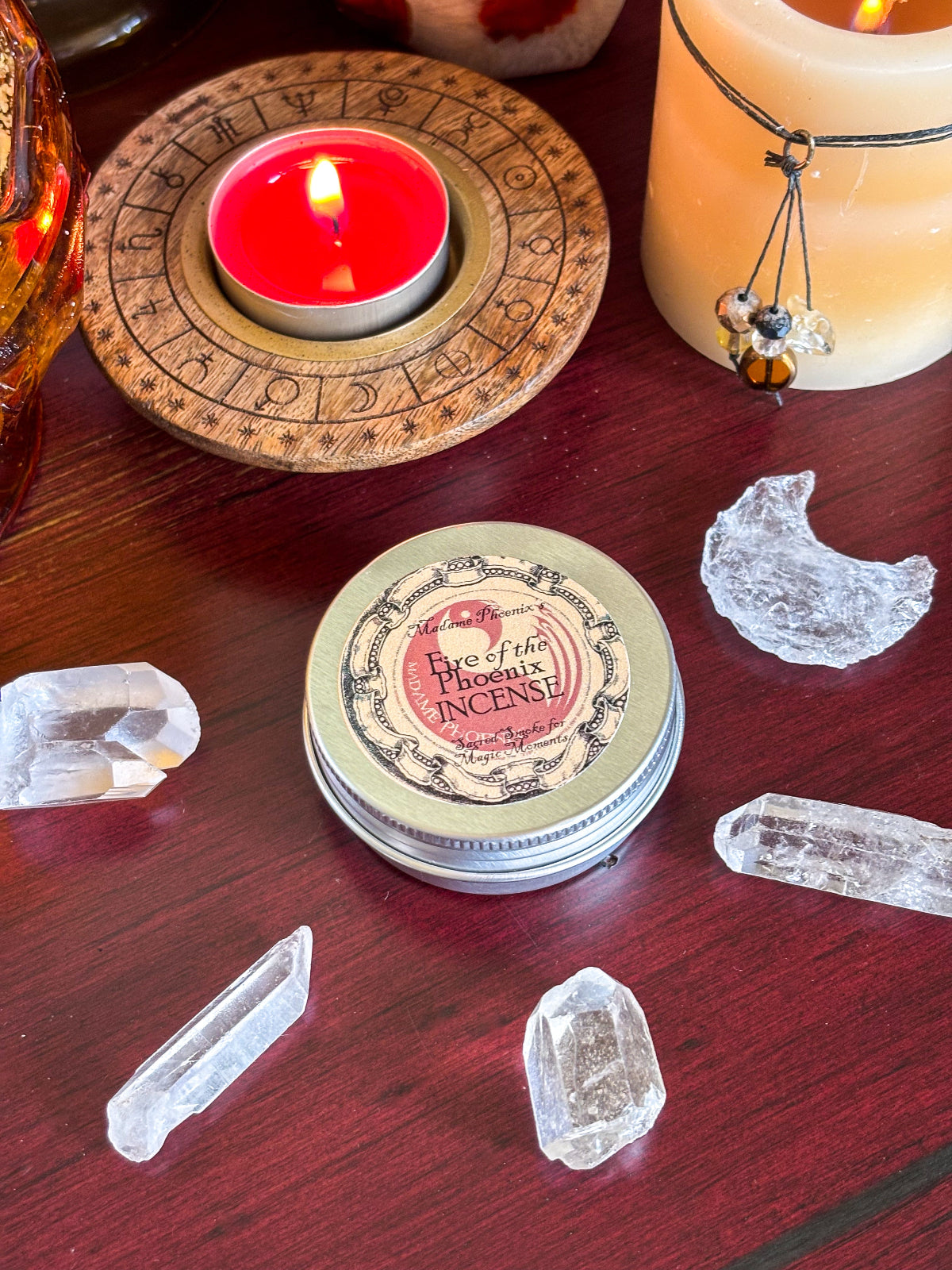 Red Phoenix Egg ritual candle with gold accents for transformation and rebirth.