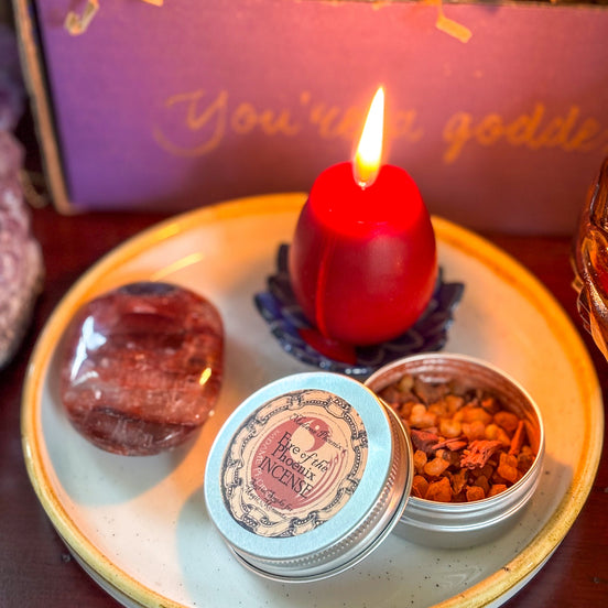 Phoenix Rebirth Ritual Bundle featuring a red Phoenix Egg Candle and Fire of the Phoenix incense.