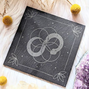 Infinite Magic Altar Tile on with a cloth background. Available at Goddess Provisions