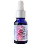 Intention essence Red Clover flower essence Bath oil body oil white background. Available at Goddess Provsions