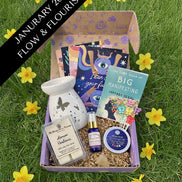 January Flow & Flourish subscription box featuring spiritual tools curated for manifestation, inner trust, and gentle expansion.